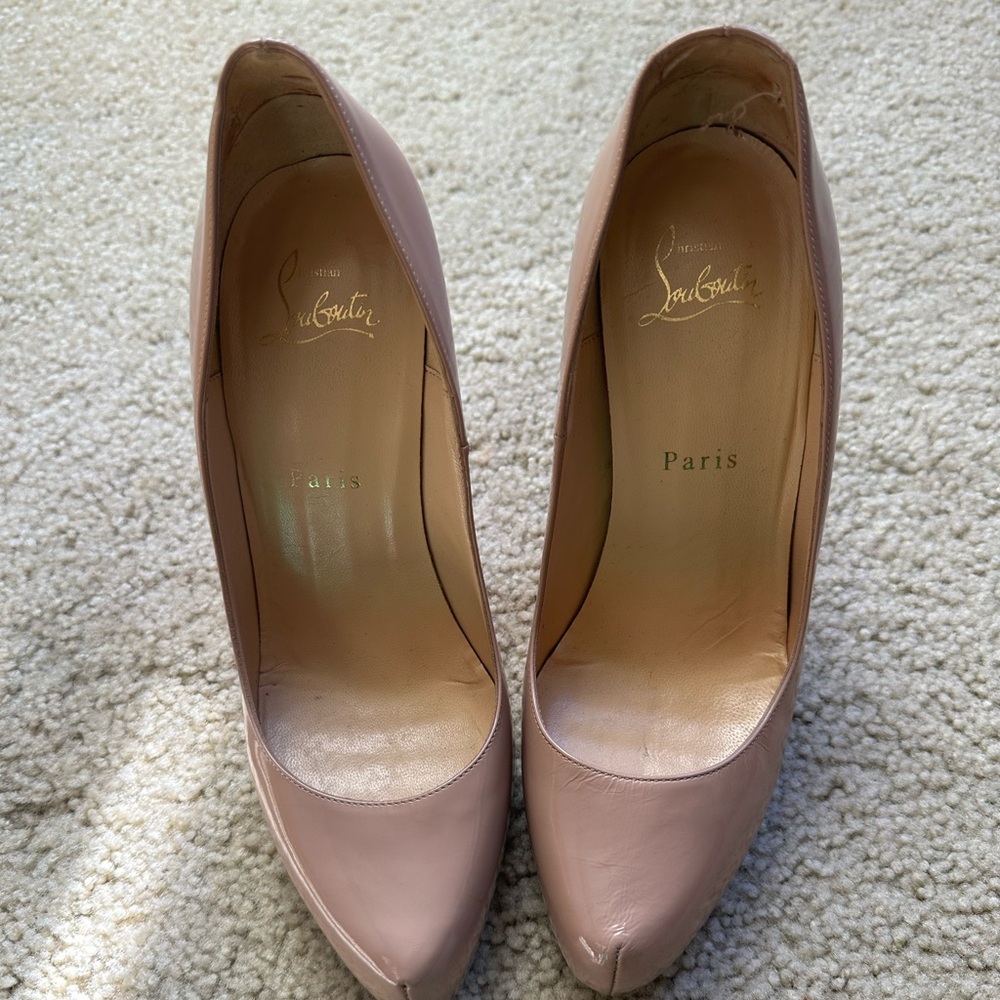 Christian Louboutin shoes nude very sexy.